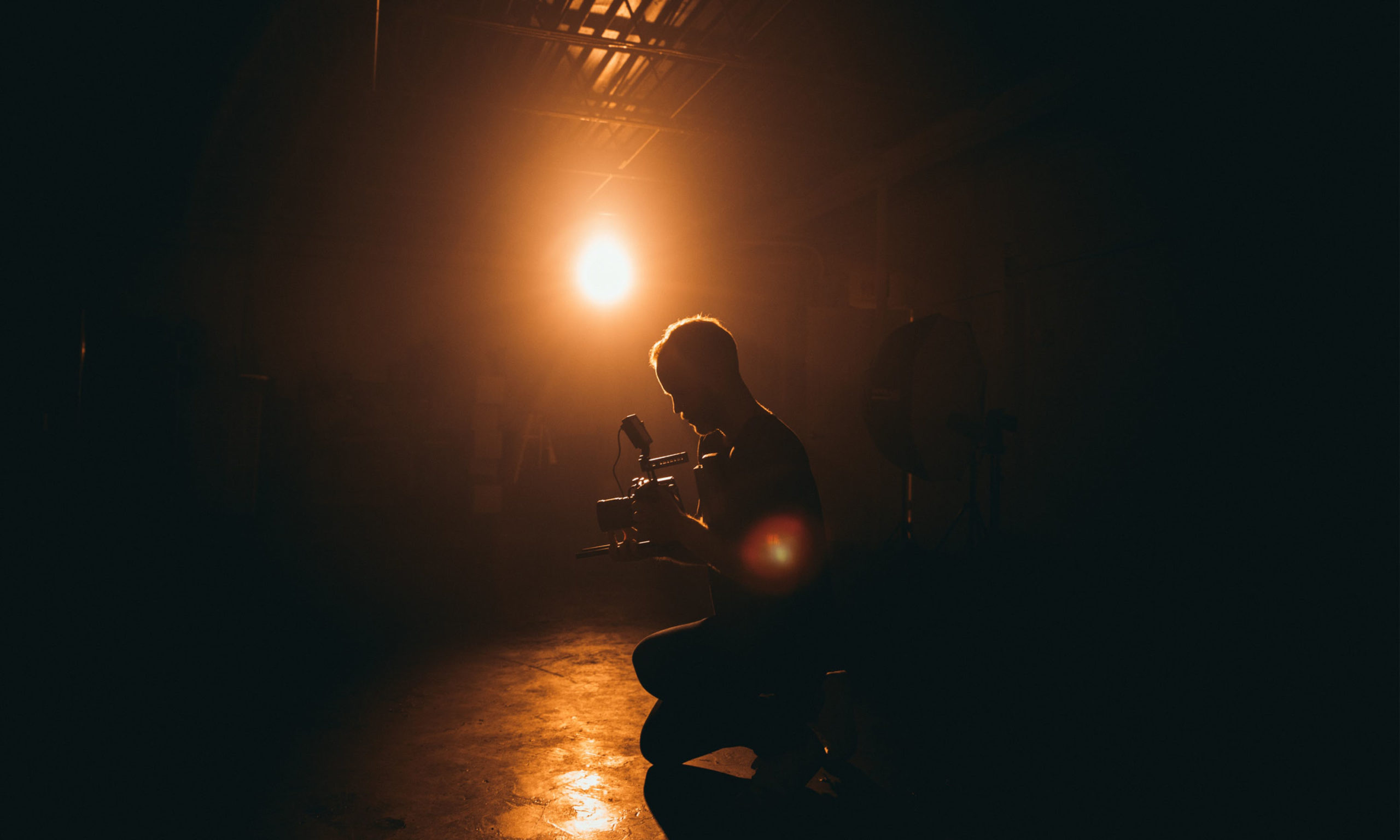 man holding camera posing for how to do a good self tape