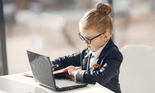 kid model typing on laptop best modelling agencies brisbane