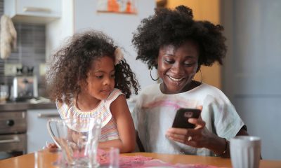 woman gets news on phone_child performance